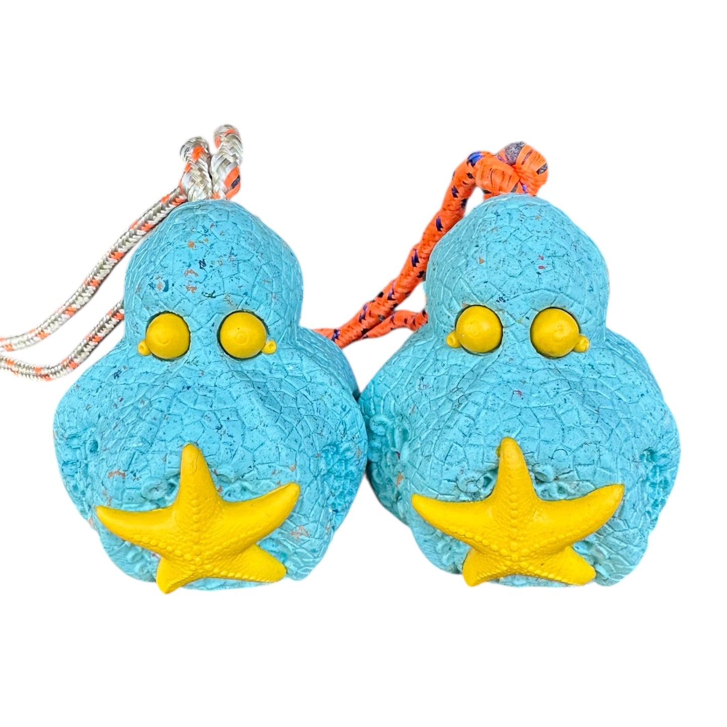 tough sustainable rubber dog chew toy in the shape of an octopus and starfish