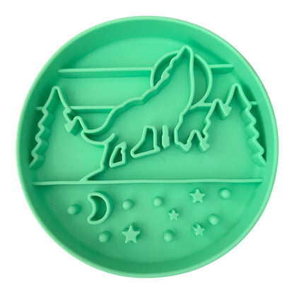 Mint silicone Dog Slow feeder bowl with mountain and wolf design. 