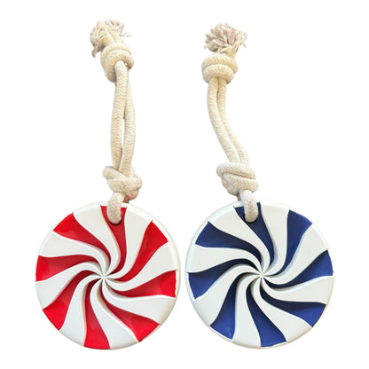 red white and blue rubber lollypop dog toys that double as a lick mat.