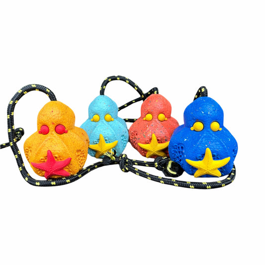 Four recycled rubber octopus-shaped dog toys in light orange, orange, light blue and blue.