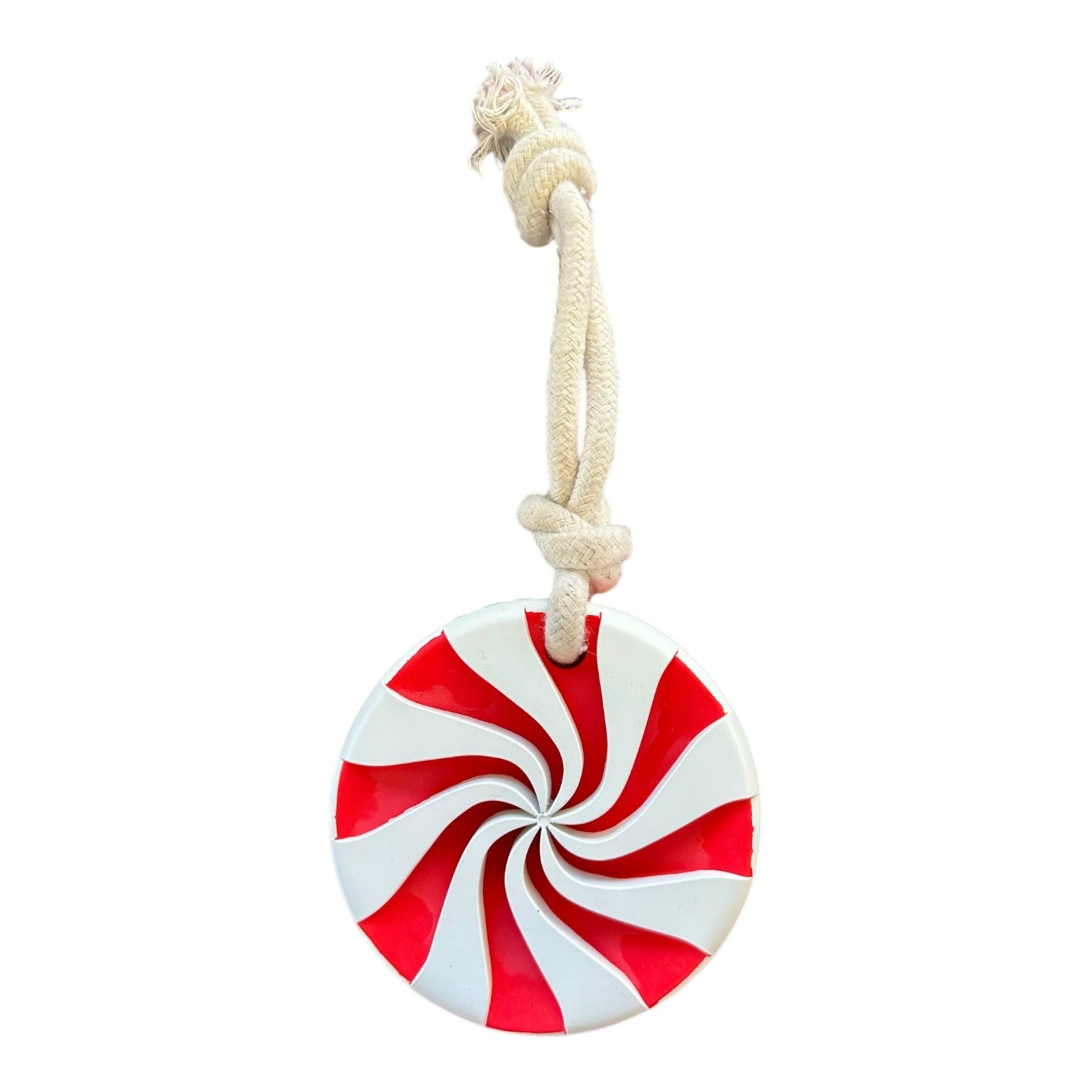 Red and white rubber lollypop dog toy on a white rope.